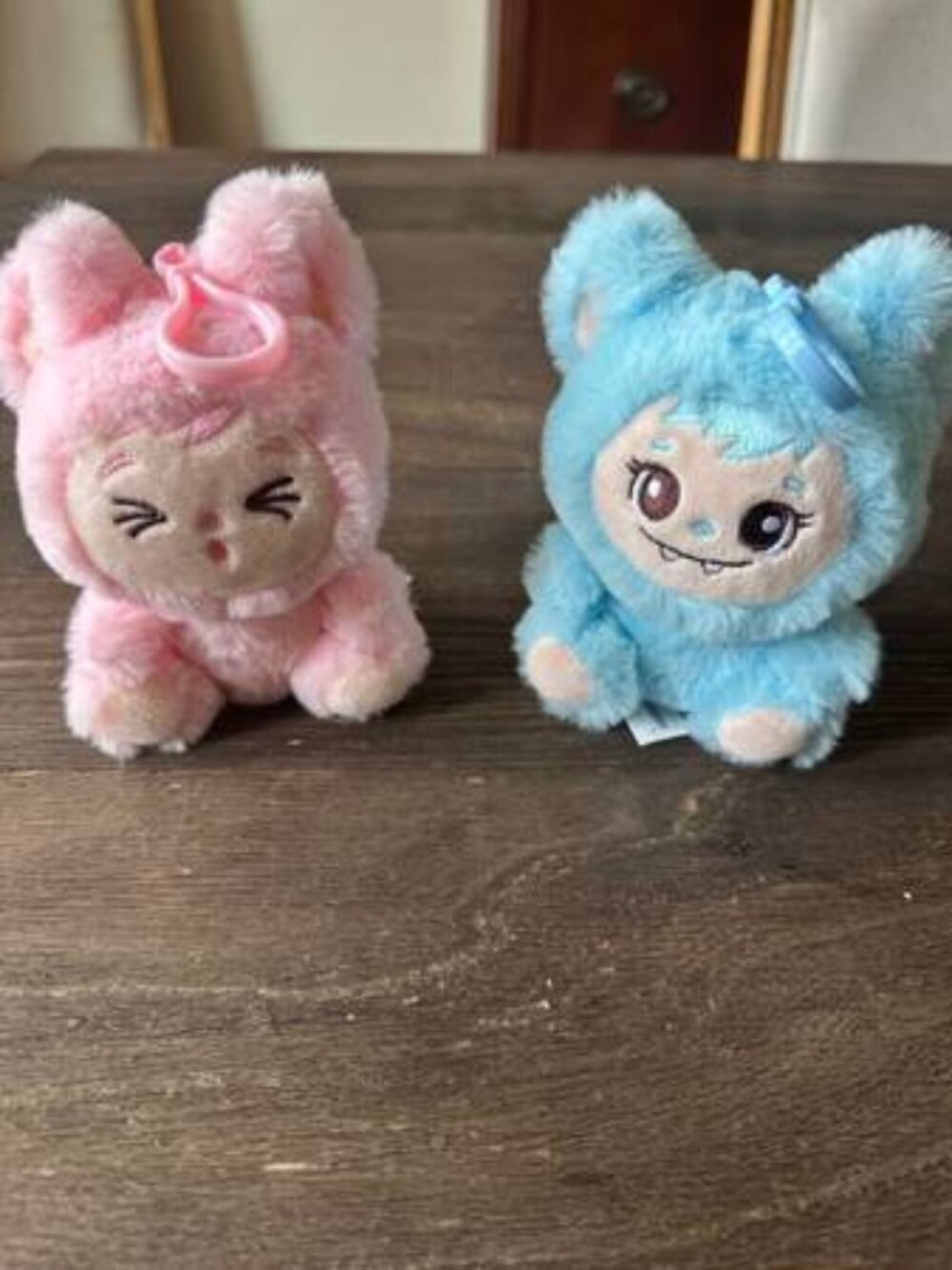 Plush girl and boy “LaBabies” backpack toys